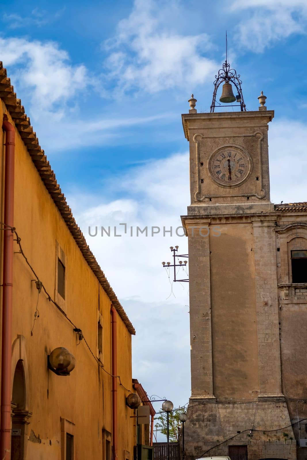 The ancient tower with clock and bell of the former Trigona, Noto, sicily