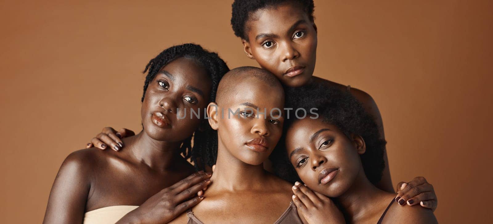 Skincare, face or happy black women models with glowing skin isolated on brown background. Facial dermatology, diversity or beauty cosmetics for makeup in studio with girl friends or African people.