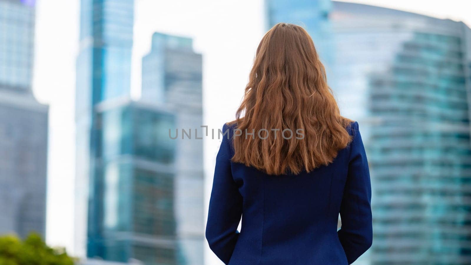 business woman with the blured city for her eyes. Businesswoman looking at futuristic blured city, Business happy new year 2024 cover concept. High quality image