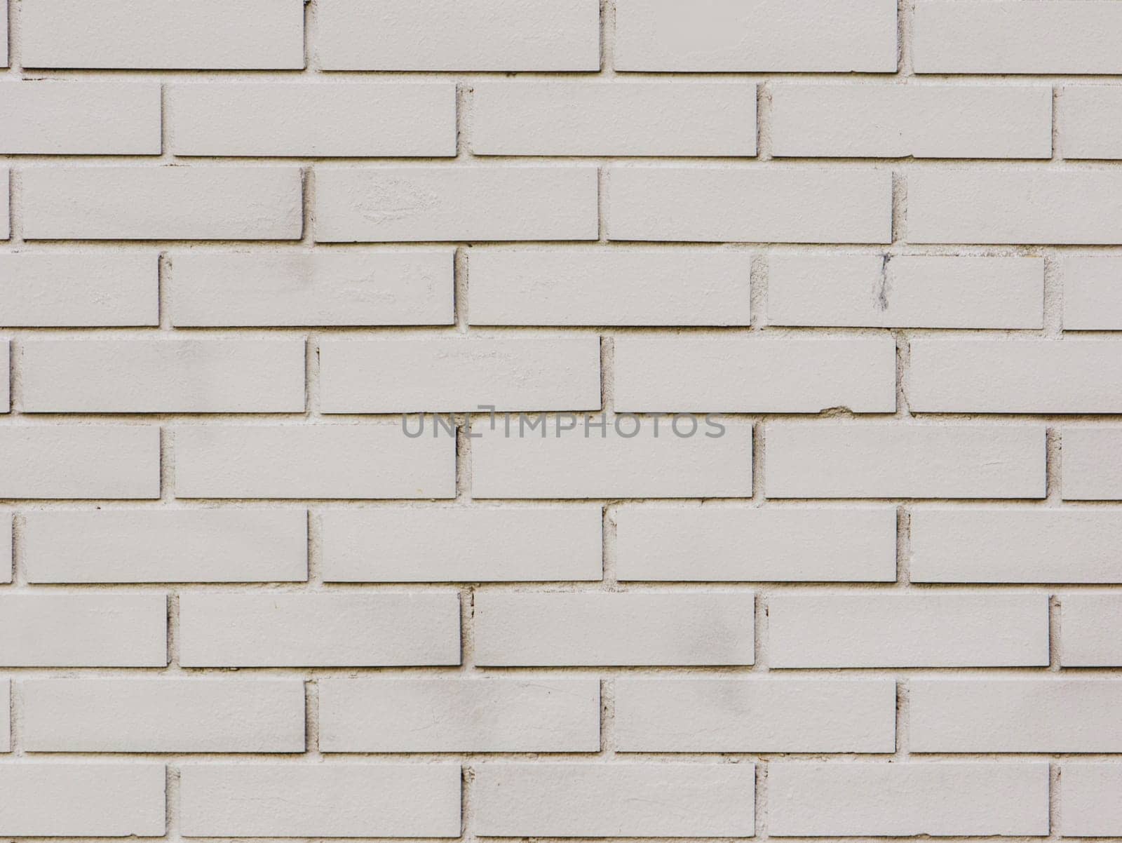 Close-up shot of a grey brick wall. by gelog67