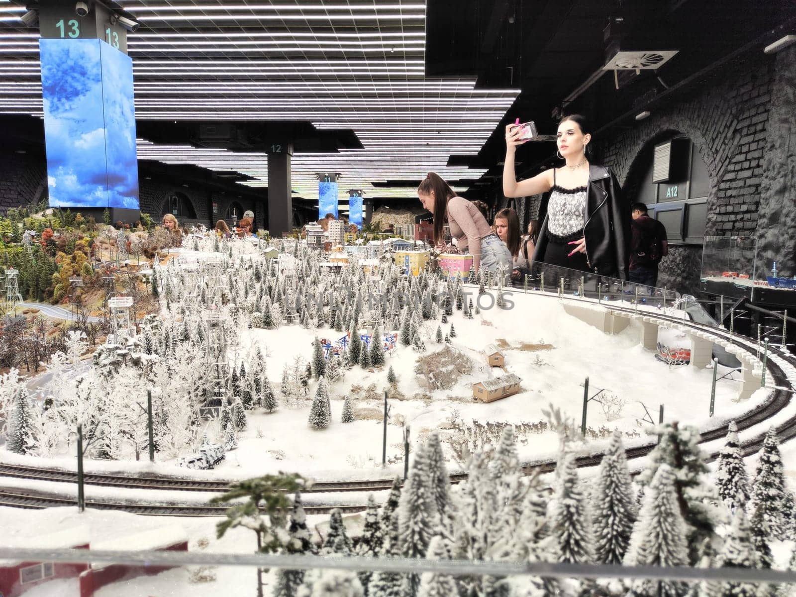 Saint-Petersburg, Russia - August 03, 2023: grand project Russia. Layout of city, country, street, landscape with small toy people, houses, roads, cars, nature and visitors tourists in the museum