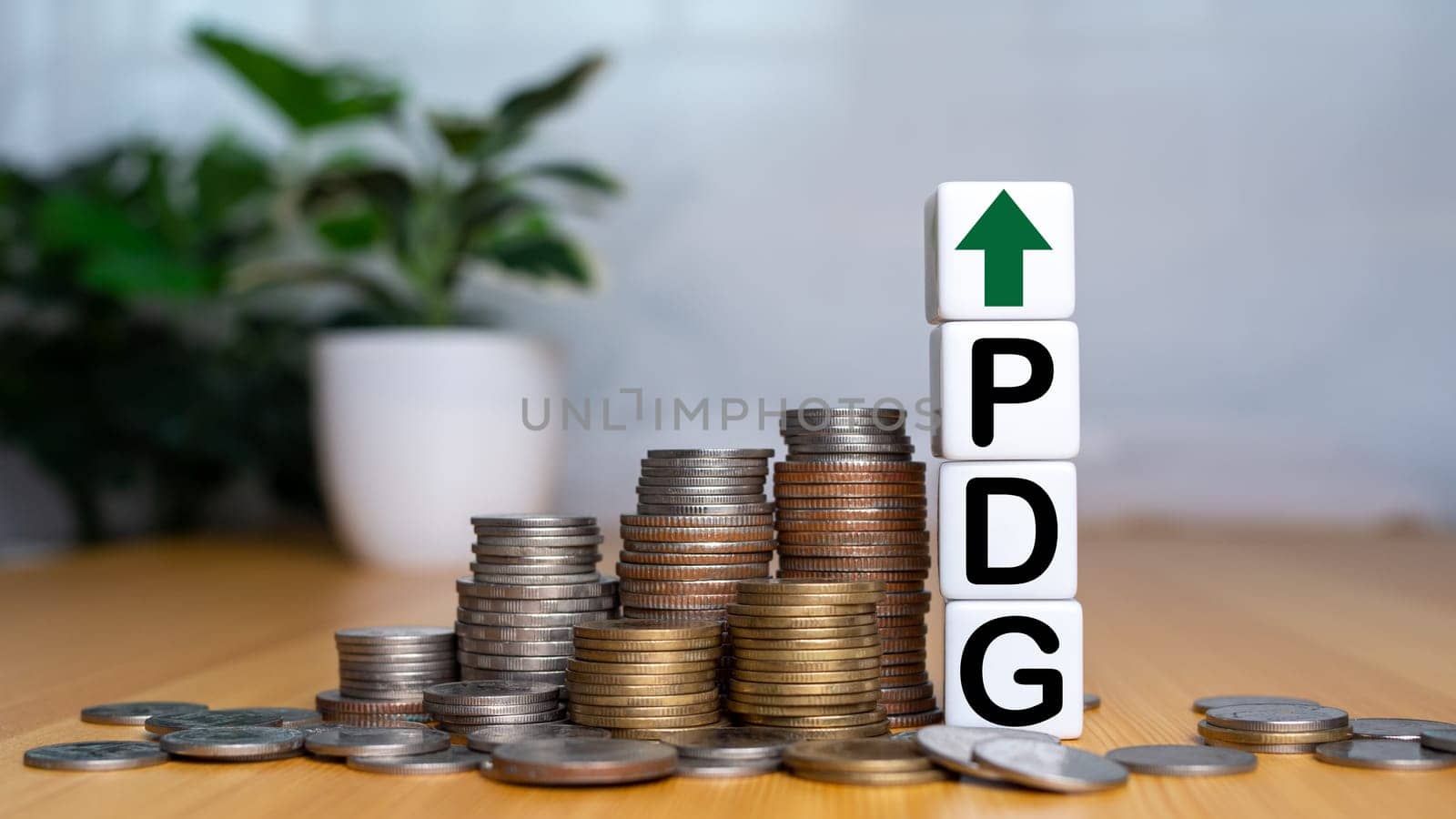 Gross domestic product, Financial, Management, Economic, Inflation, recession and Money concepts, GDP block with Coins stack and UP and Down arrow symbol icon.  by Unimages2527