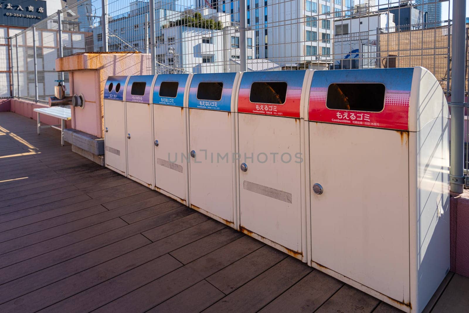 Tokyio, Japan. January 2024. bins for separate waste collection on a street in the city center