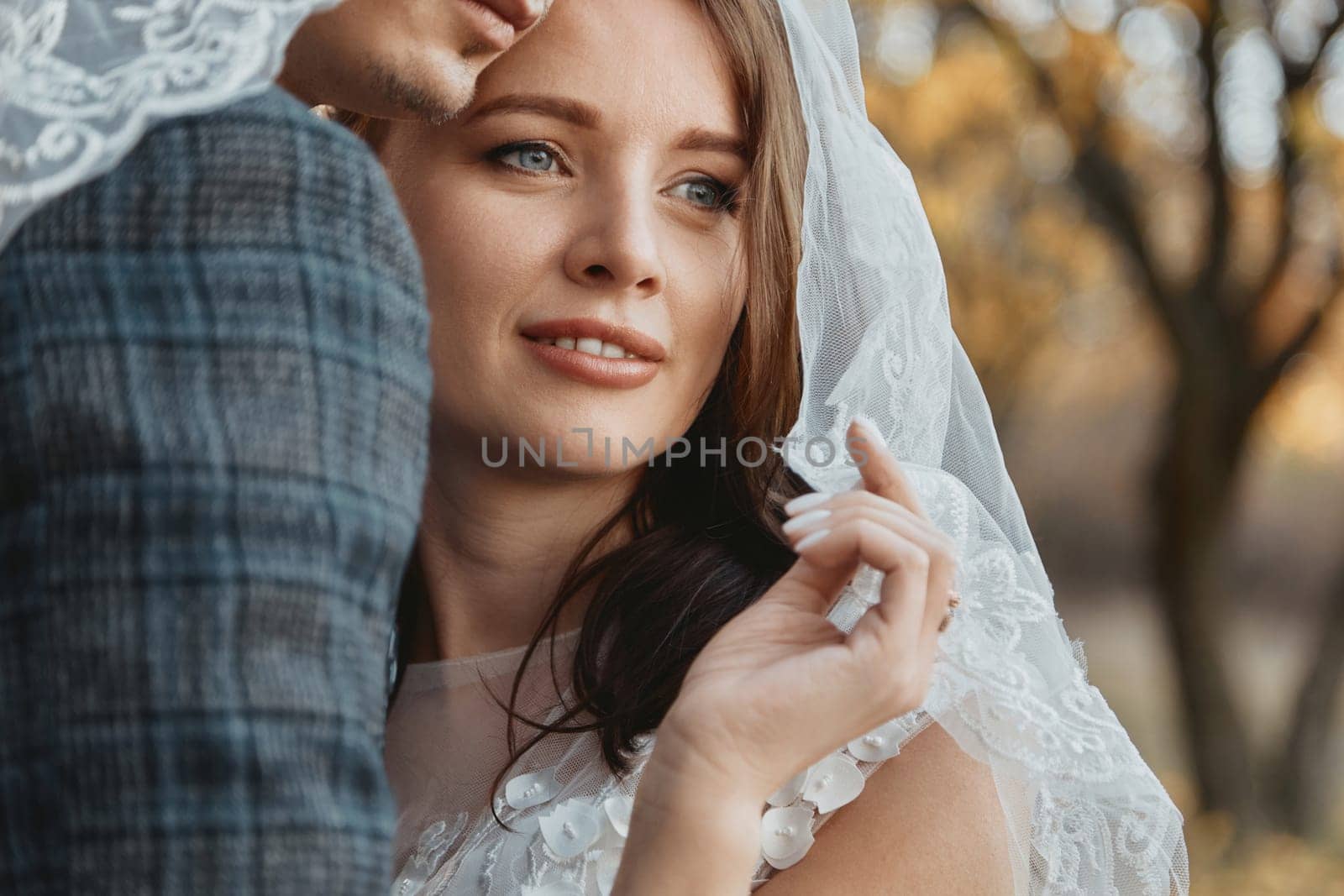 bride and groom enjoying romantic moments outside by erstudio