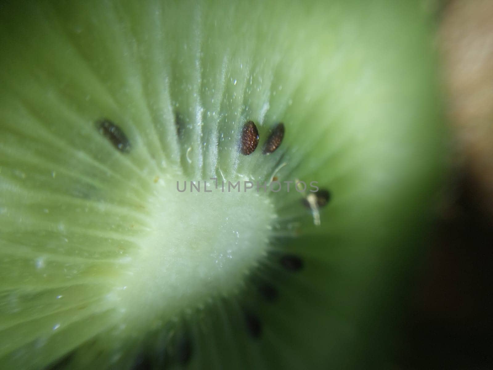 Fresh green kiwi fruit on a the plate