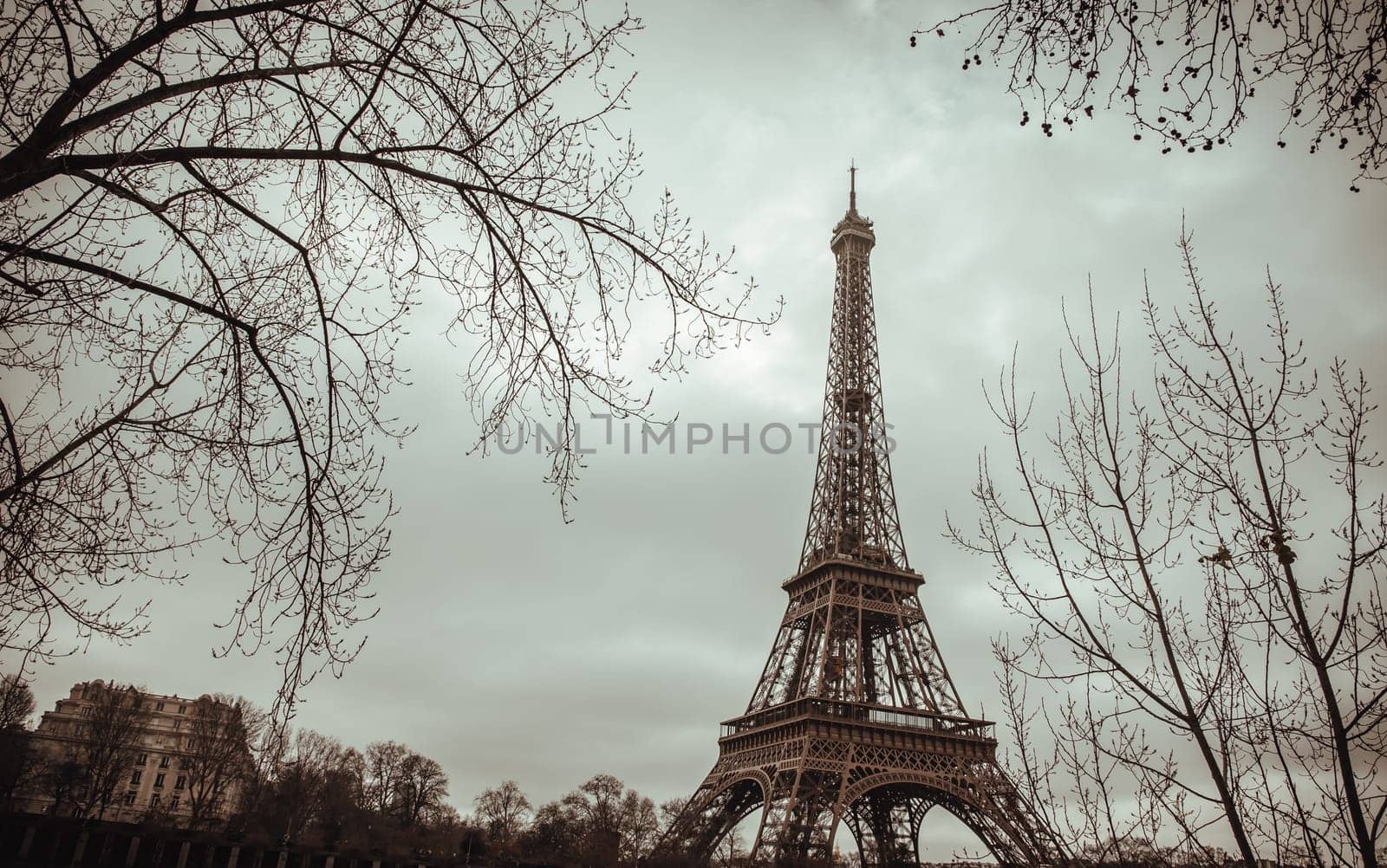 France, Paris - Jan 4, 2024 - Nice scenery of Eiffel Tower in Paris at Afternoon. Destinations in Europe. Space for text, Selective focus.
