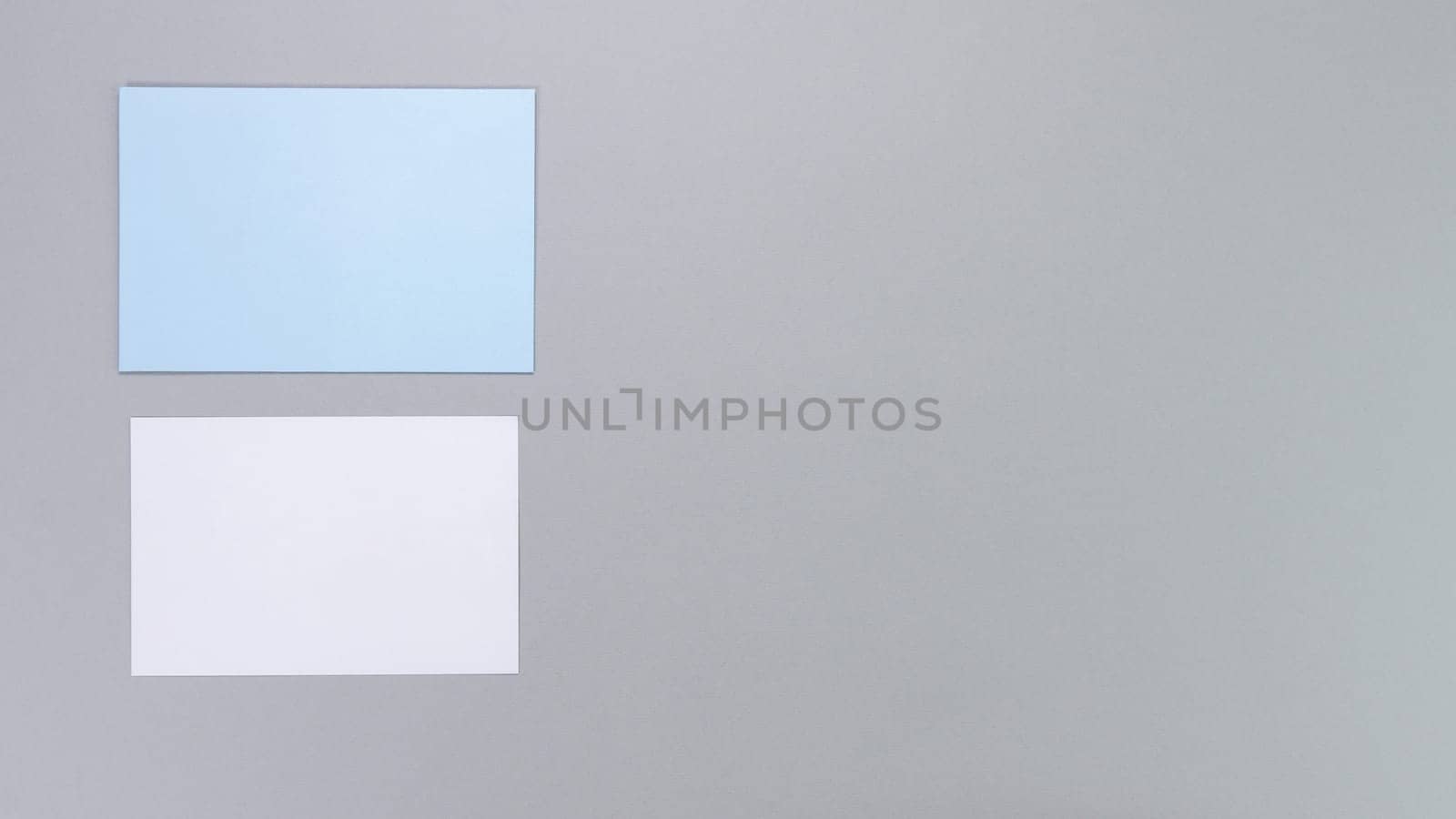 Template composition with blank photo cards, gift cards, photo frame and isolated on grey background for easy editing. Mockup, photo card, Christmas card, greeting card.
