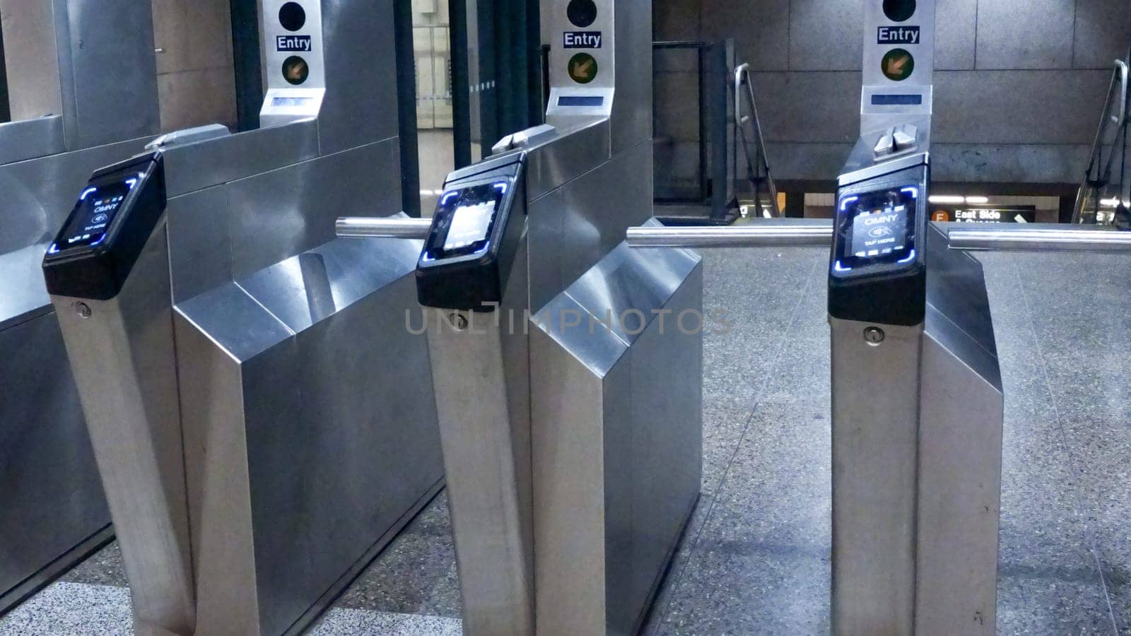 OMNY MTA Contactless fare payment system at grand central terminal. New York Subway station. NY, USA - July 15, 2023. by JuliaDorian
