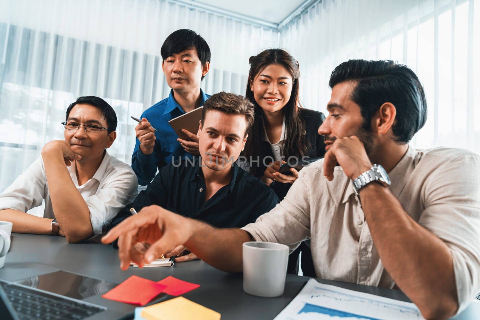 Group of diverse office worker employee working together on strategic business marketing planning in corporate office room. Positive teamwork in business workplace concept. Prudent