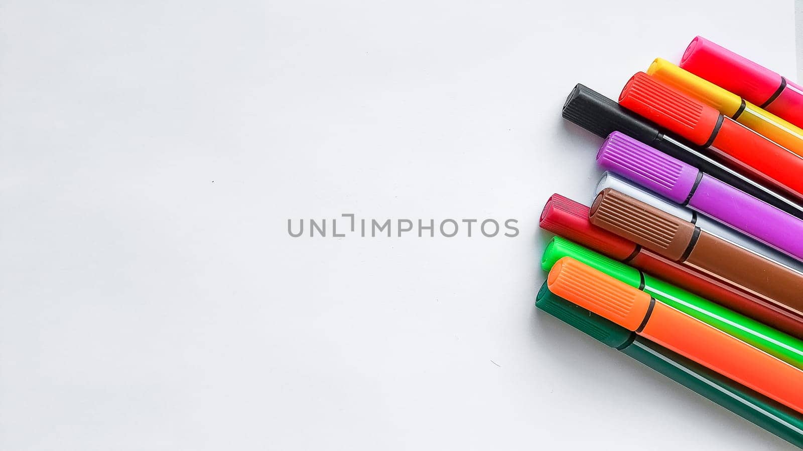 Multicolored Felt Tip Pens with colour lines.Copy space