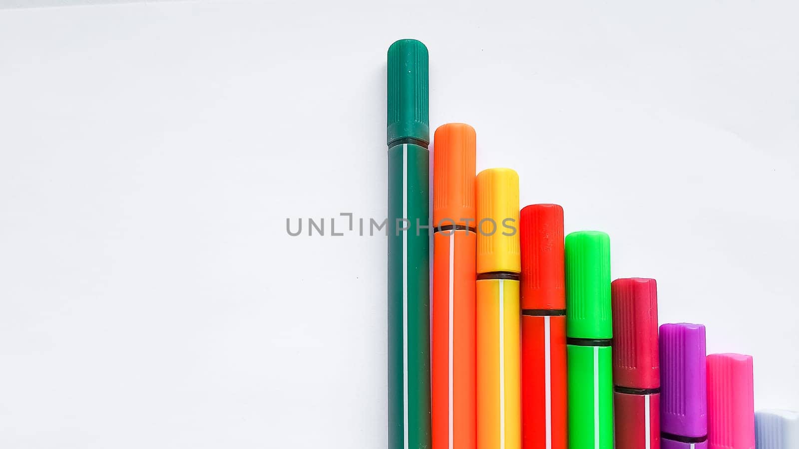 Multicolored Felt Tip Pens with colour lines.Copy space