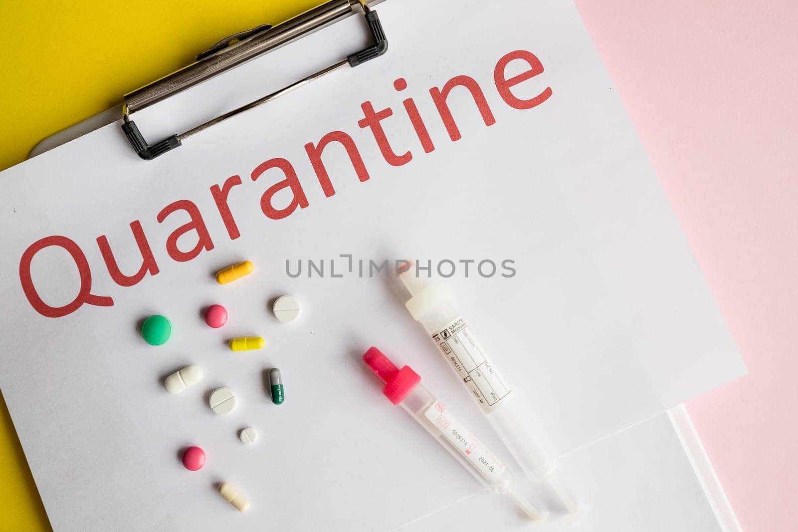 2 may, Moscow, Russia. clipboard with words quarantine, blood samples and medicines on pastel background, closeup.Blood test.Clipboard with colorful pills and test tube, copy space by YuliaYaspe1979