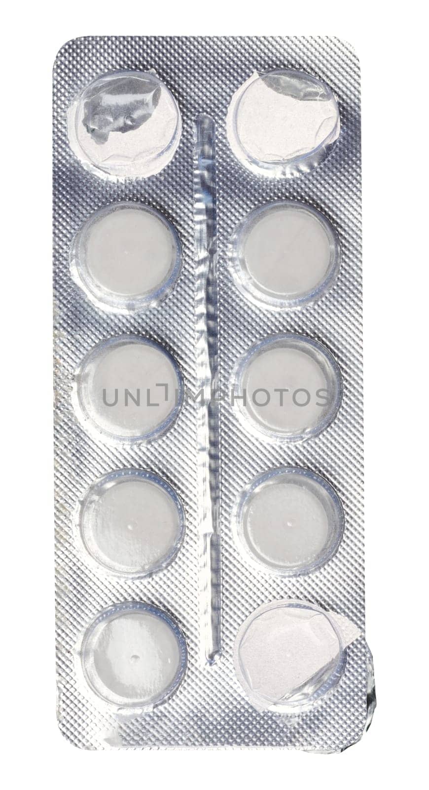 Round white tablets in blister pack, top view by ndanko