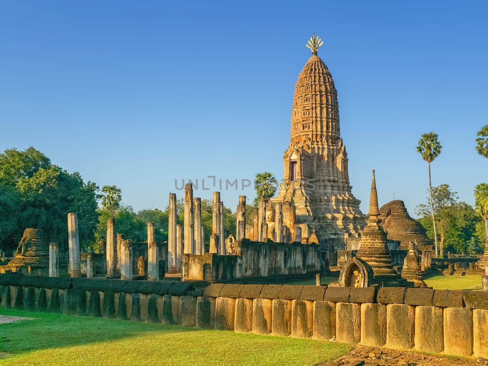 Wat Phra Sri Rattana Mahathat Rajaworavuharn temple in Si Satchanalai historical park, Thailand by Elenaphotos21