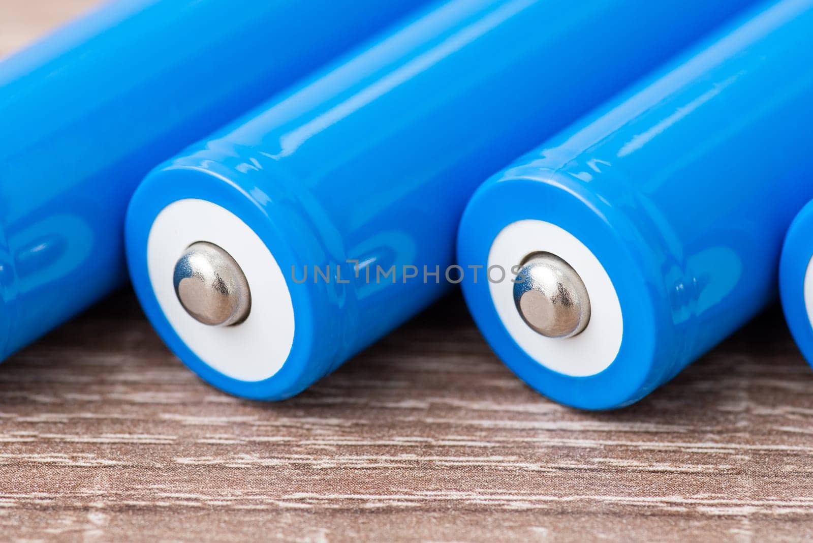 Close up of positive contact of rechargeable li-ion batteries by VitaliiPetrushenko