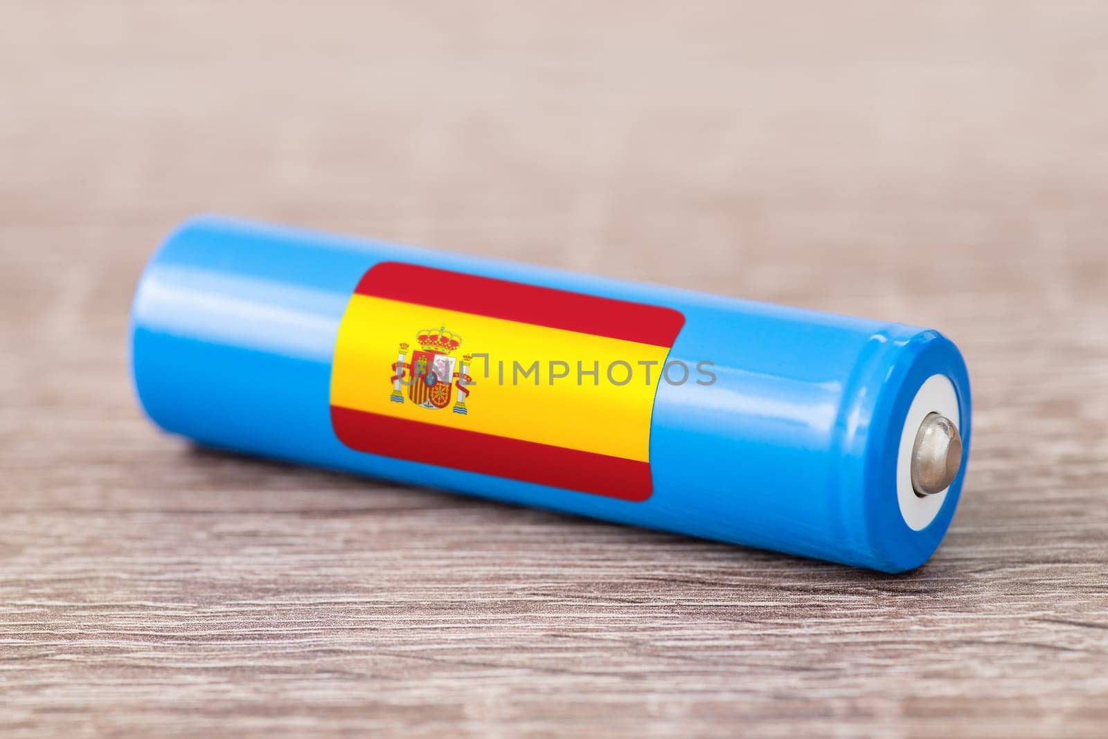Rechargeable li-ion battery with flag of Spain by VitaliiPetrushenko