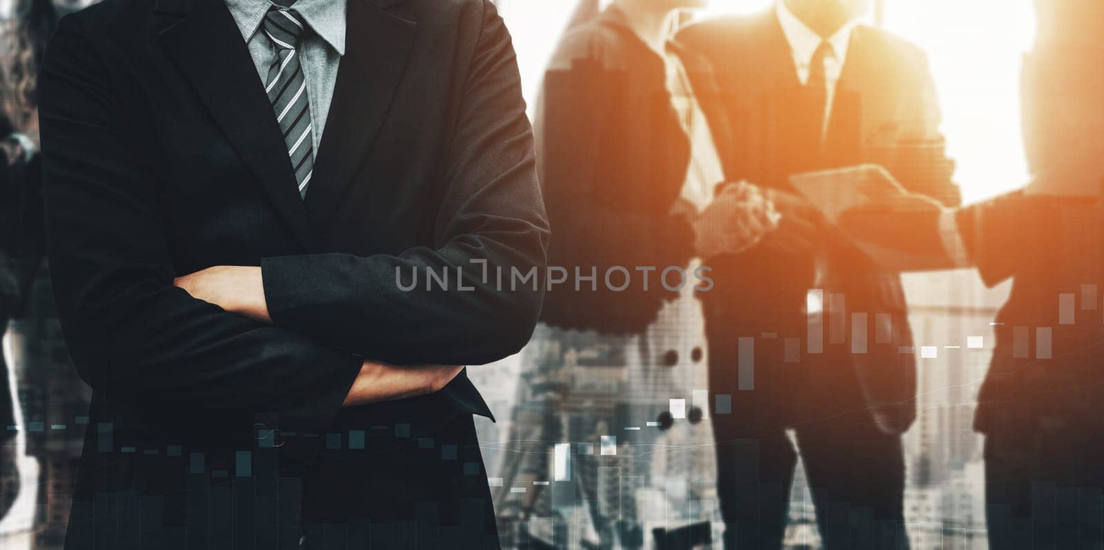Business people group standing together with city office building background double exposure. Modern corporate job and human resources recruiting concept.