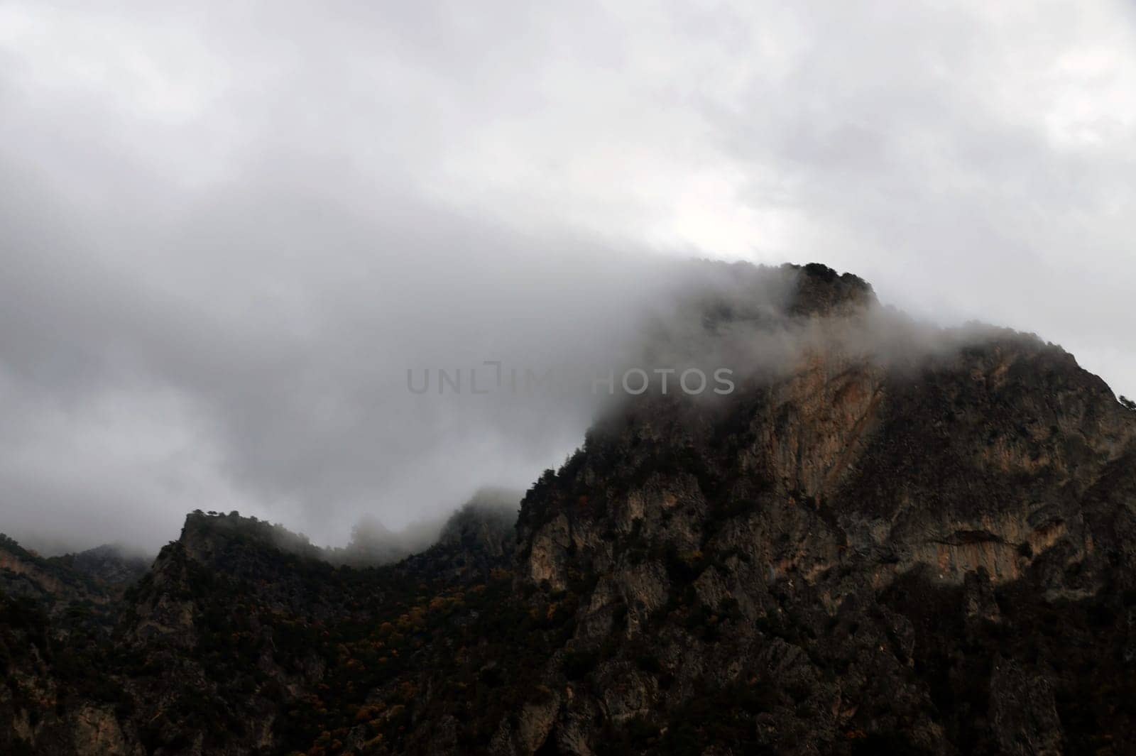 thick fog and clouds in the mountains by Annado