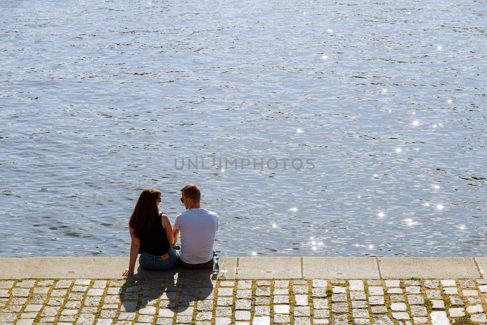 22 May 2022 Prague, Czech Republic. River side setting created a picturesque backdrop for their romantic photoshoot.