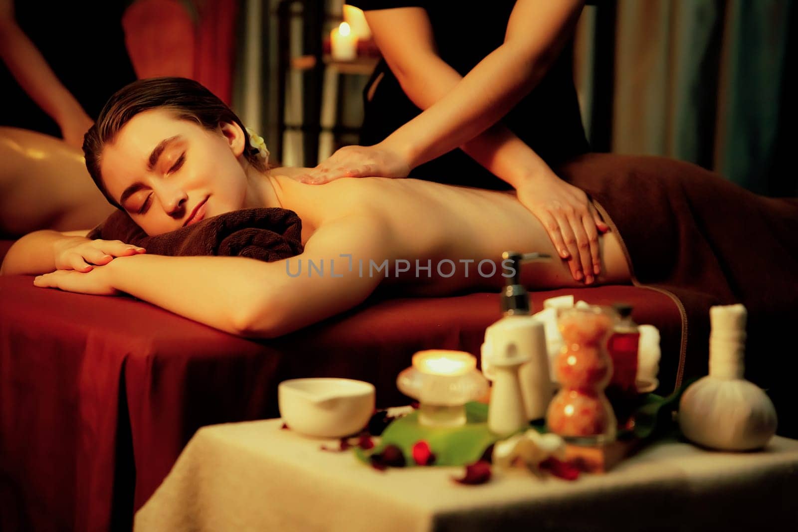 Caucasian couple customer enjoying relaxing anti-stress massage. Quiescent by biancoblue