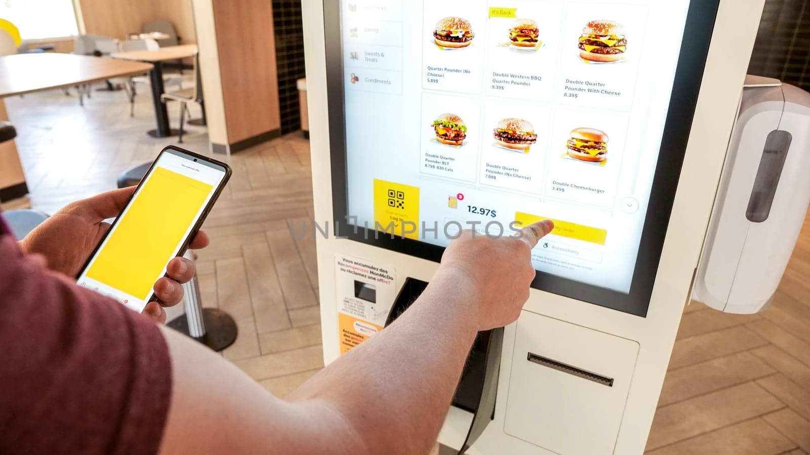 Close up shot of self-ordering kiosk at McDonald's restaurant in Canada. Ottawa ON Canada - 08.15. 2023 by JuliaDorian