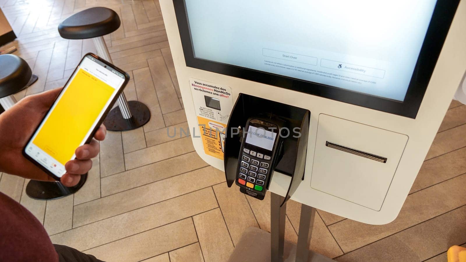 Close up shot of self-ordering kiosk at McDonald's restaurant in Canada. Ottawa ON Canada - 08.15. 2023 by JuliaDorian