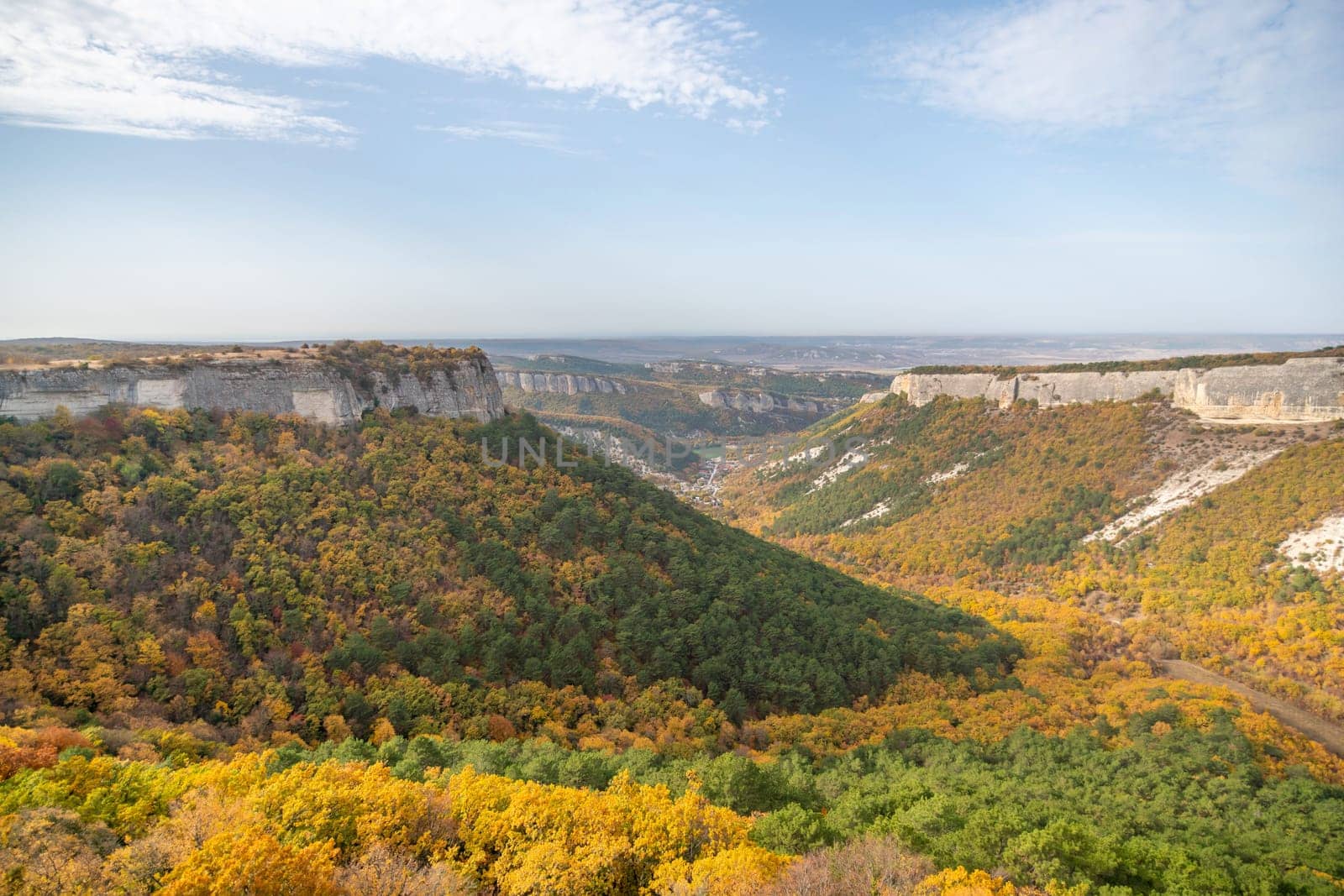 The autumn landscape of the mountain valley is an amazing, beautiful place at any time of the year. Hiking. Nature.