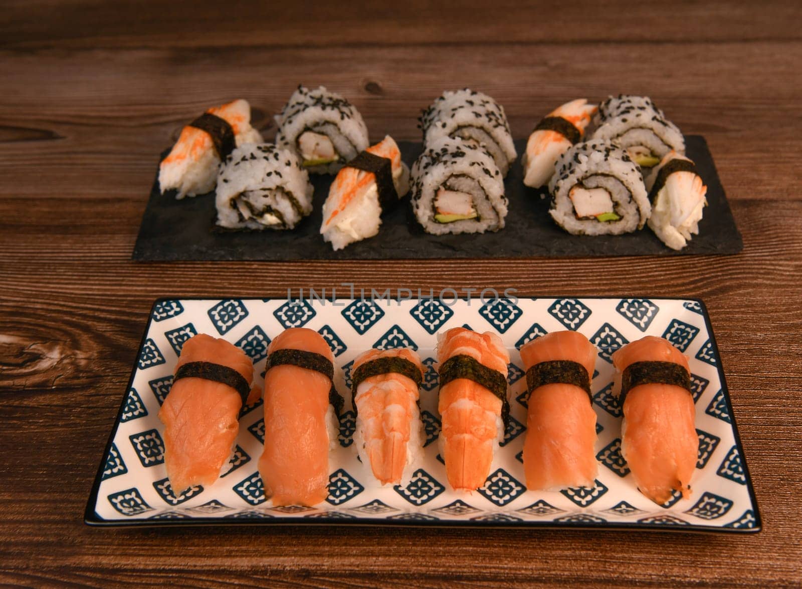 Japanese sushi food, Maki ands rolls with tuna, salmon, shrimp, crab and avocado by FreeProd