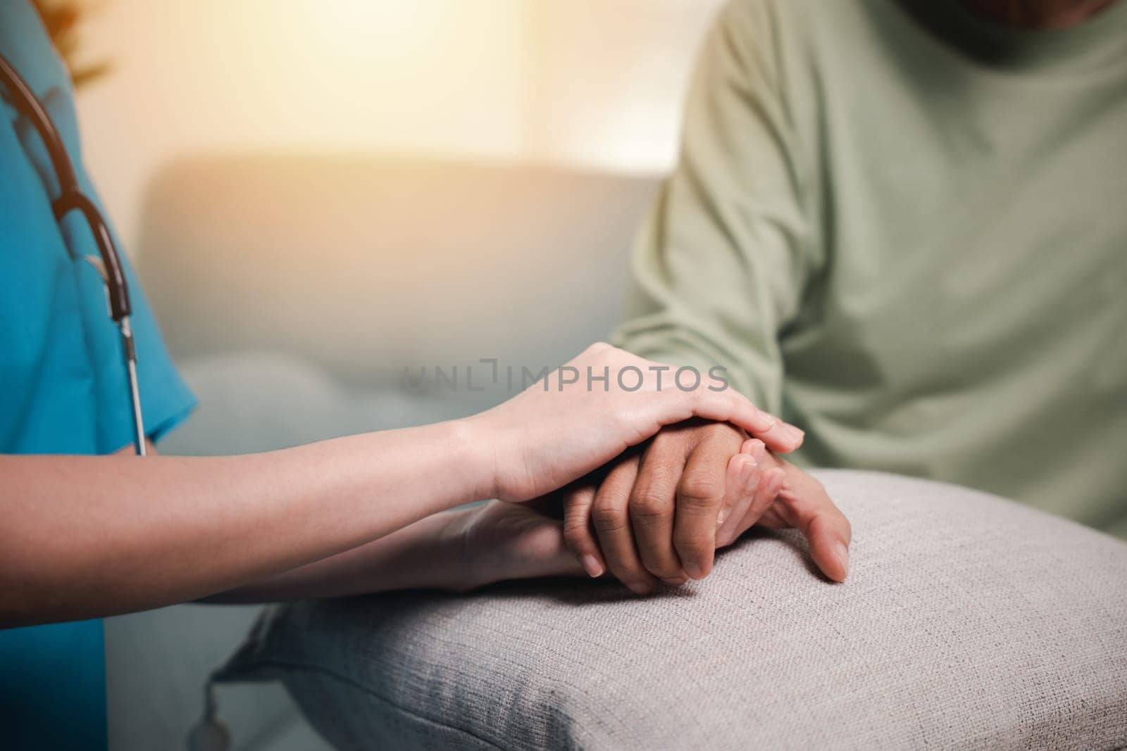 International Day for the Elderly. Caring nurse helping elderly old man care facility gets help from hospital, young woman helping hands offering her senior man at home, old aged