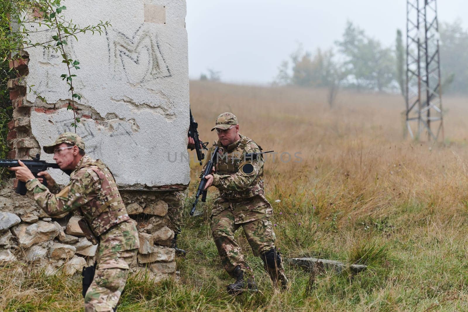 In a high stakes mission, a specialized military unit executes a tactical operation to secure a dangerous house where terrorists are believed to be hiding, showcasing precision and coordinated maneuvers.