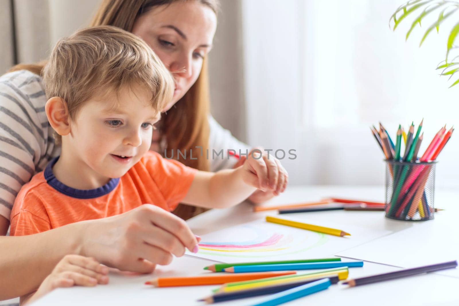 Mother and Child Enjoying Drawing Time Together by andreyz