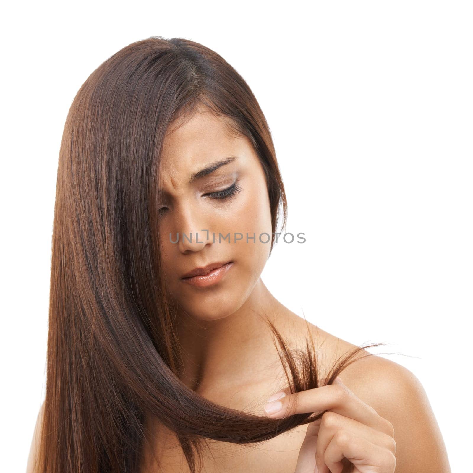 Hair care, woman and stress in studio with hairstyle texture, treatment damage or keratin hairloss problem. Model, person and frustrated with salon split ends, cosmetics or growth on white background.