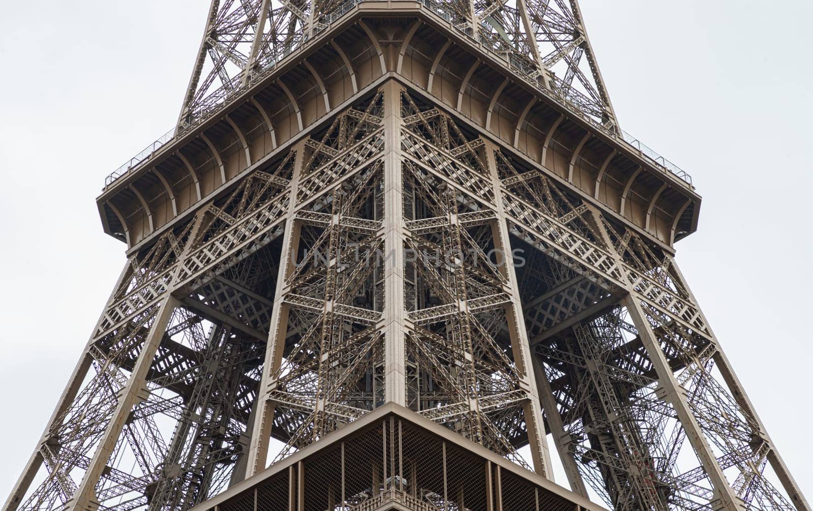 France, Paris - Jan 4, 2024 - Architectural detail design of the famous Eiffel Tower iron structure. Close-up of the framework of the Eiffel Tower in Paris, France, Space for text, Selective focus.