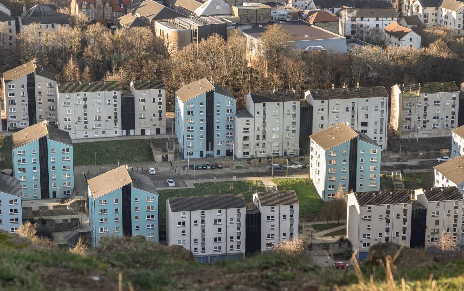 Edinburgh, Scotland - Jan 17, 2024 - Aerial view of modern apartment buildings in Dumbiedykes housing estate area. Tenement houses, Blocks and flats, Residential modern architecture in Edinburgh city centre Scotland, Space for text, Selective focus.
