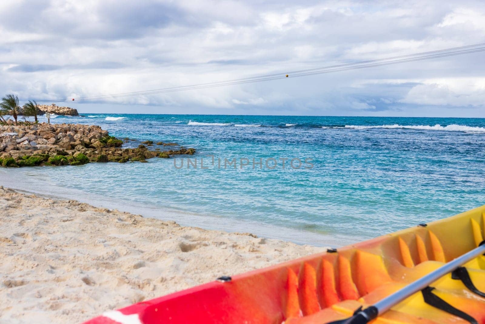 Active rest, sport, kayak. Canoe on a sandy beach