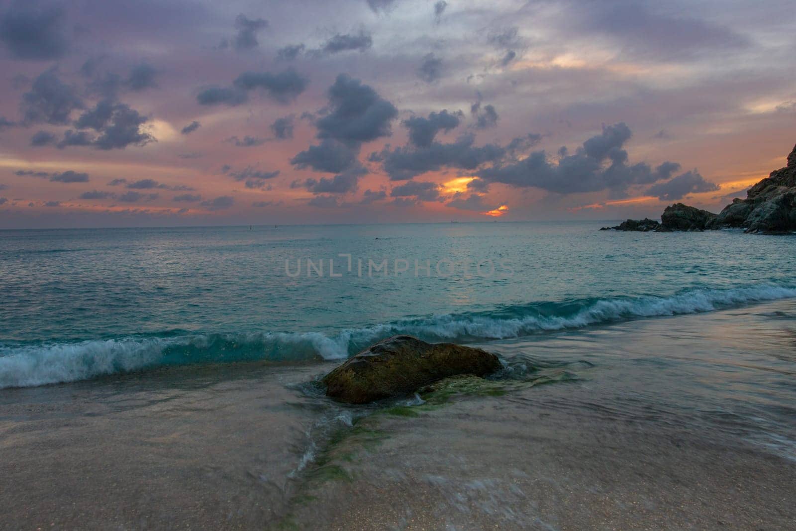 View of a peaceful sunset and waves on Shell Beach, Saint Barthélemy (St. Barts)