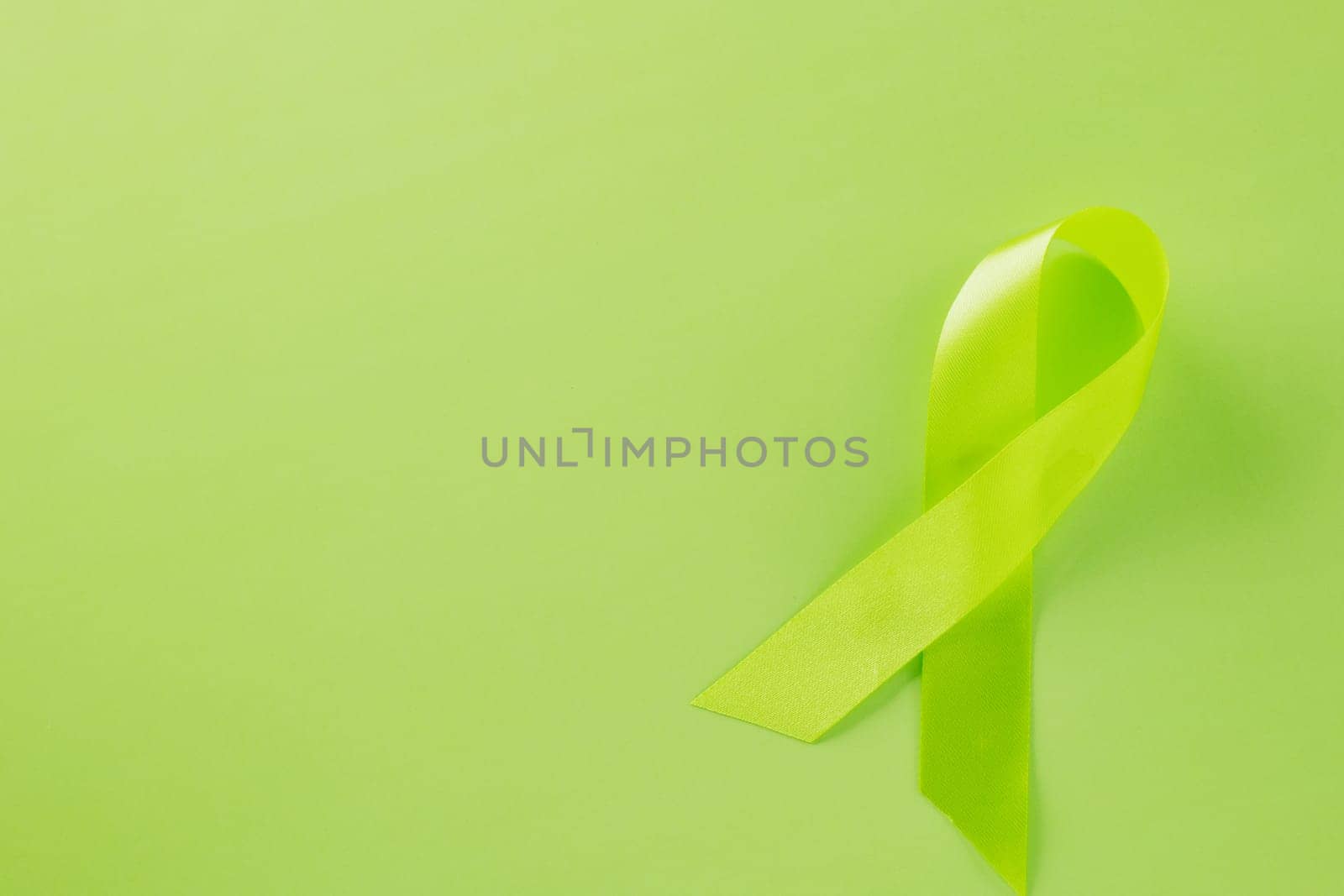 Green awareness ribbon symbol of Gallbladder and Bile Duct Cancer month by Sorapop