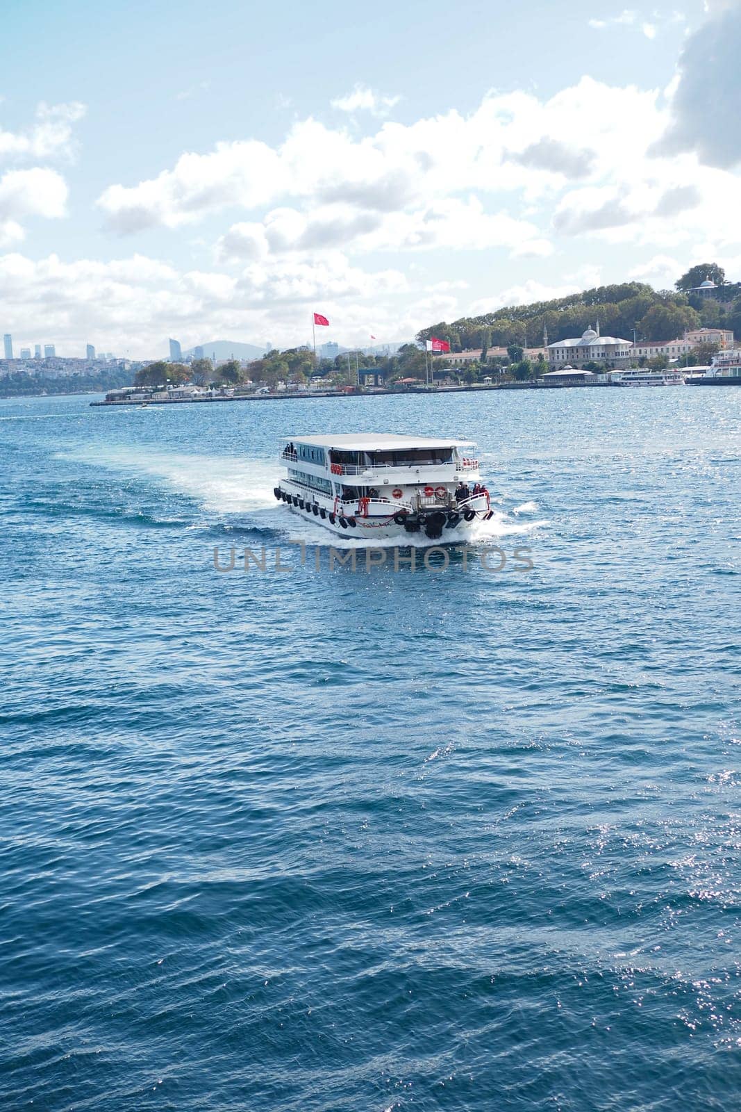 Turkey istanbul 18 july 2023. Transport ferry in the Bosphorus. Ferryboat carries passengers.