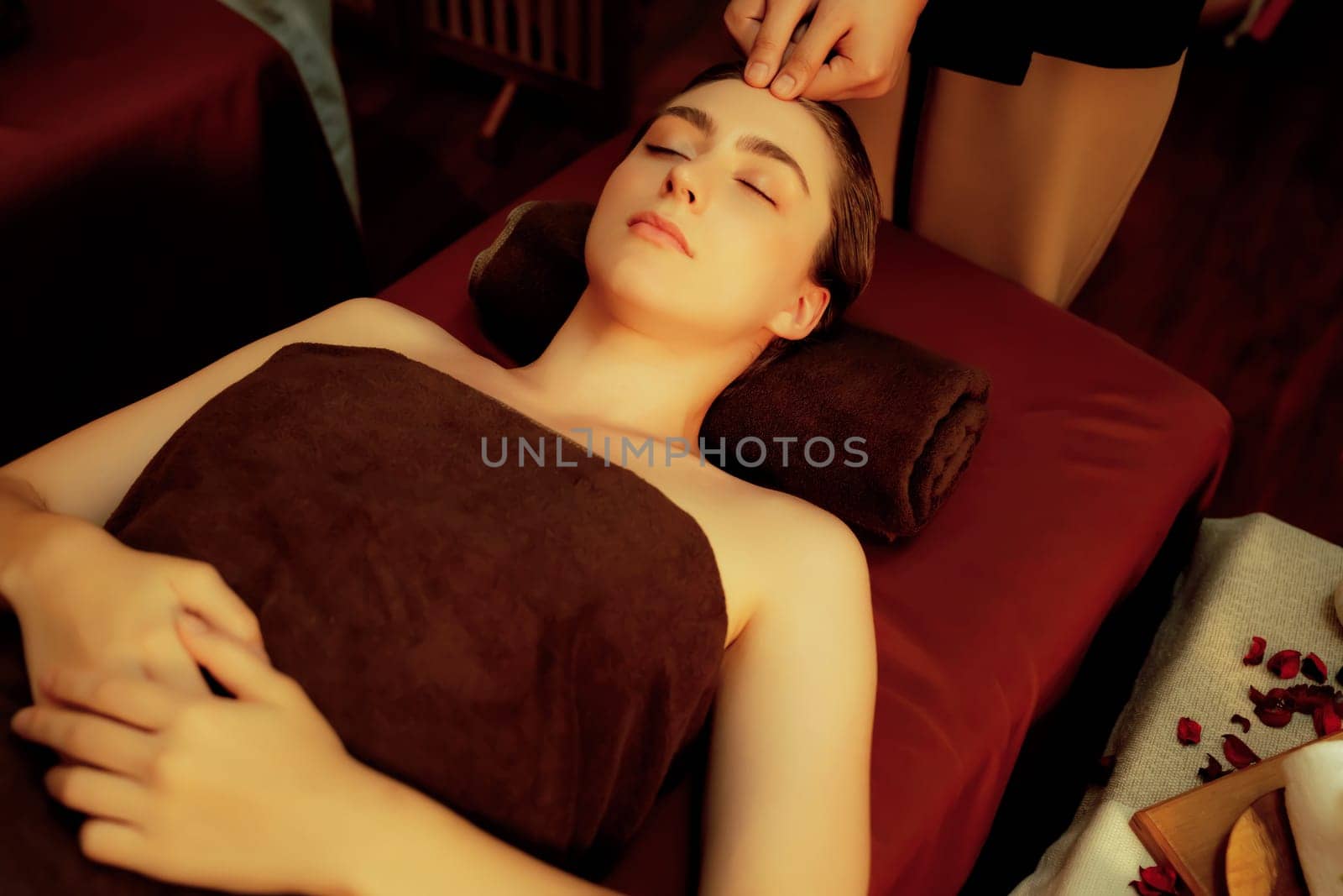 Caucasian woman enjoying relaxing anti-stress head massage. Quiescent by biancoblue