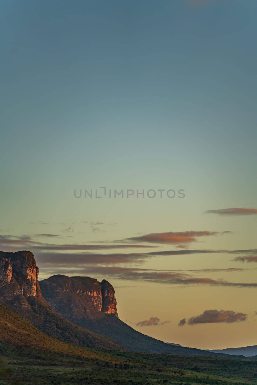 Majestic Sunset Glow on Rugged Mountain Landscape by FerradalFCG