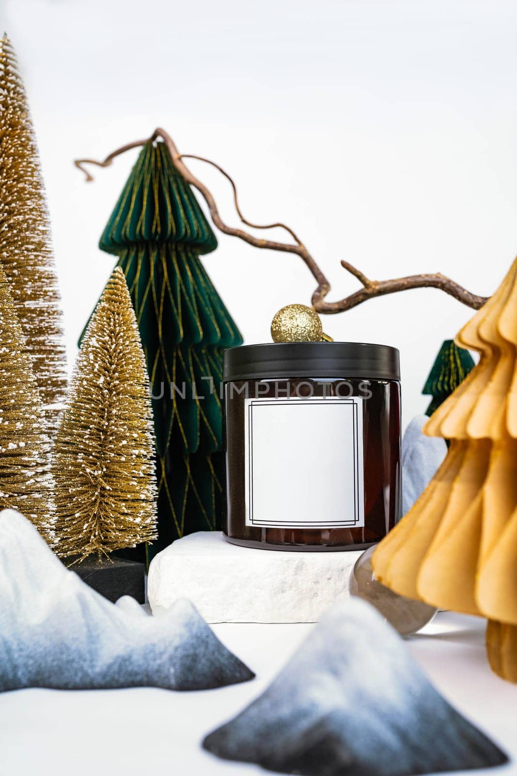 dark jar with lid on the background of Christmas decorations, side view by tewolf