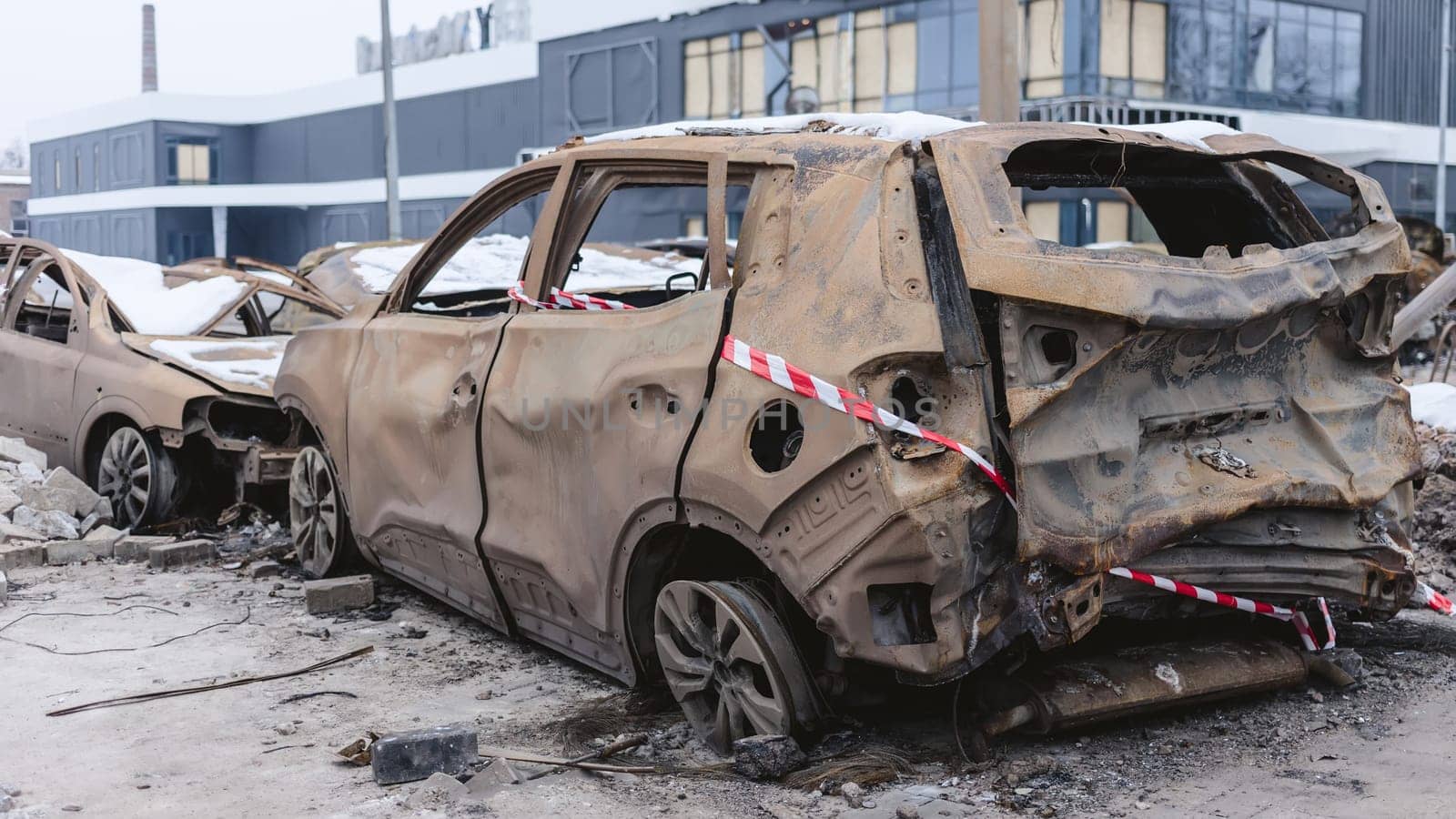 Kyiv, Ukraine - January 3, 2024: Burned civilians cars after a Russian's missiles attack by sarymsakov