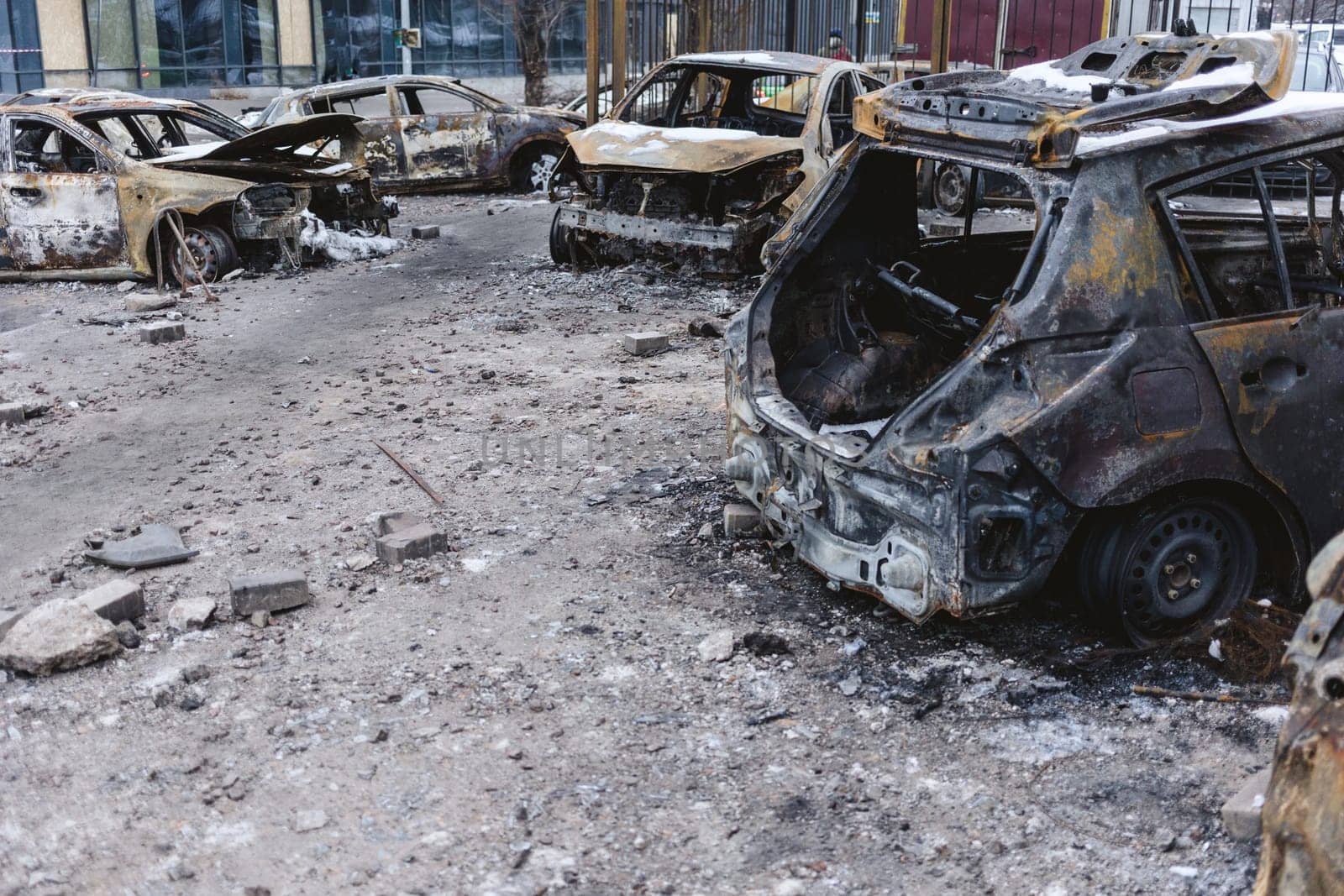 Kyiv, Ukraine - January 3, 2024: Burned civilians cars after a Russian's missiles attack.