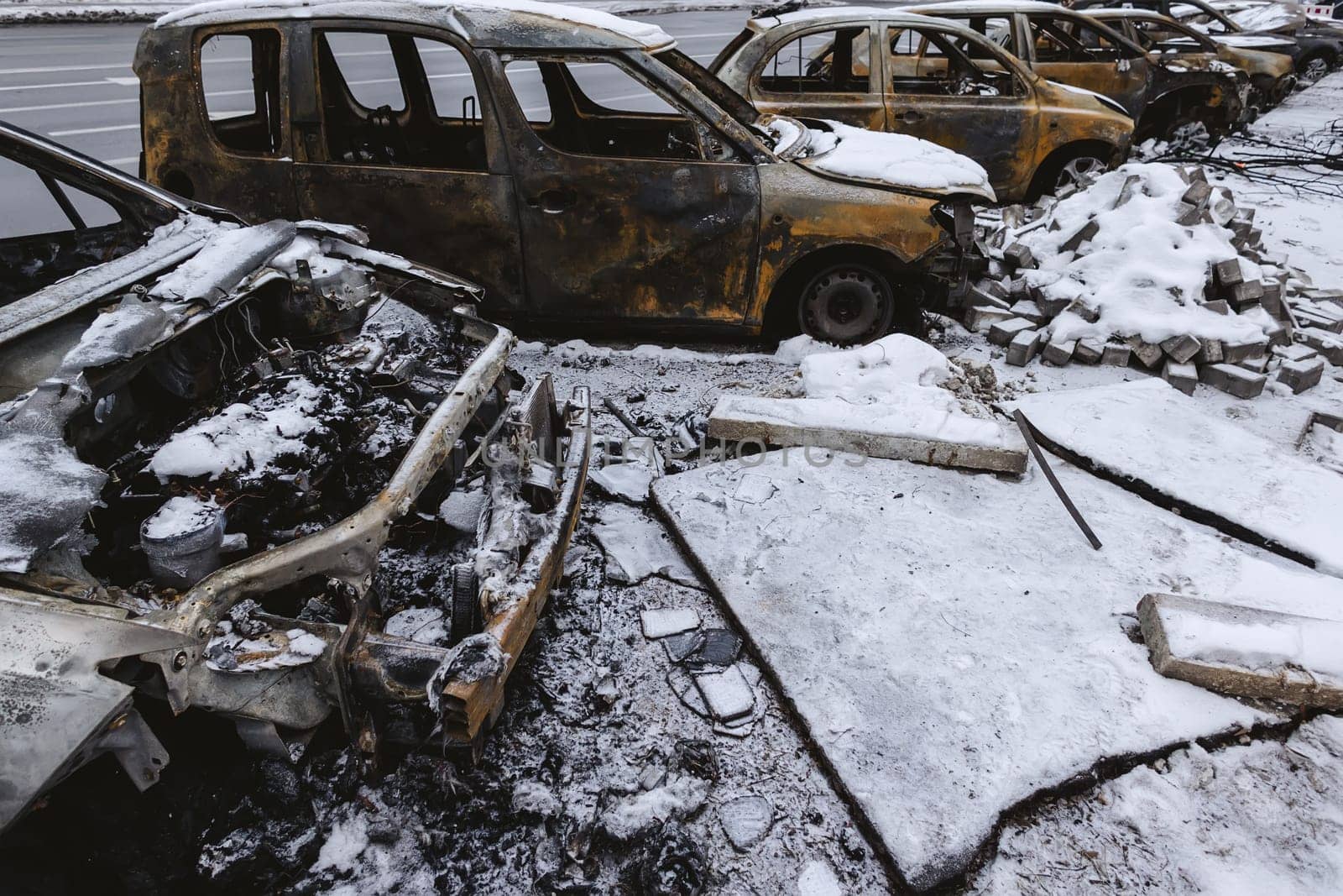 Kyiv, Ukraine - January 3, 2024: Burned civilians cars after a Russian's missiles attack.