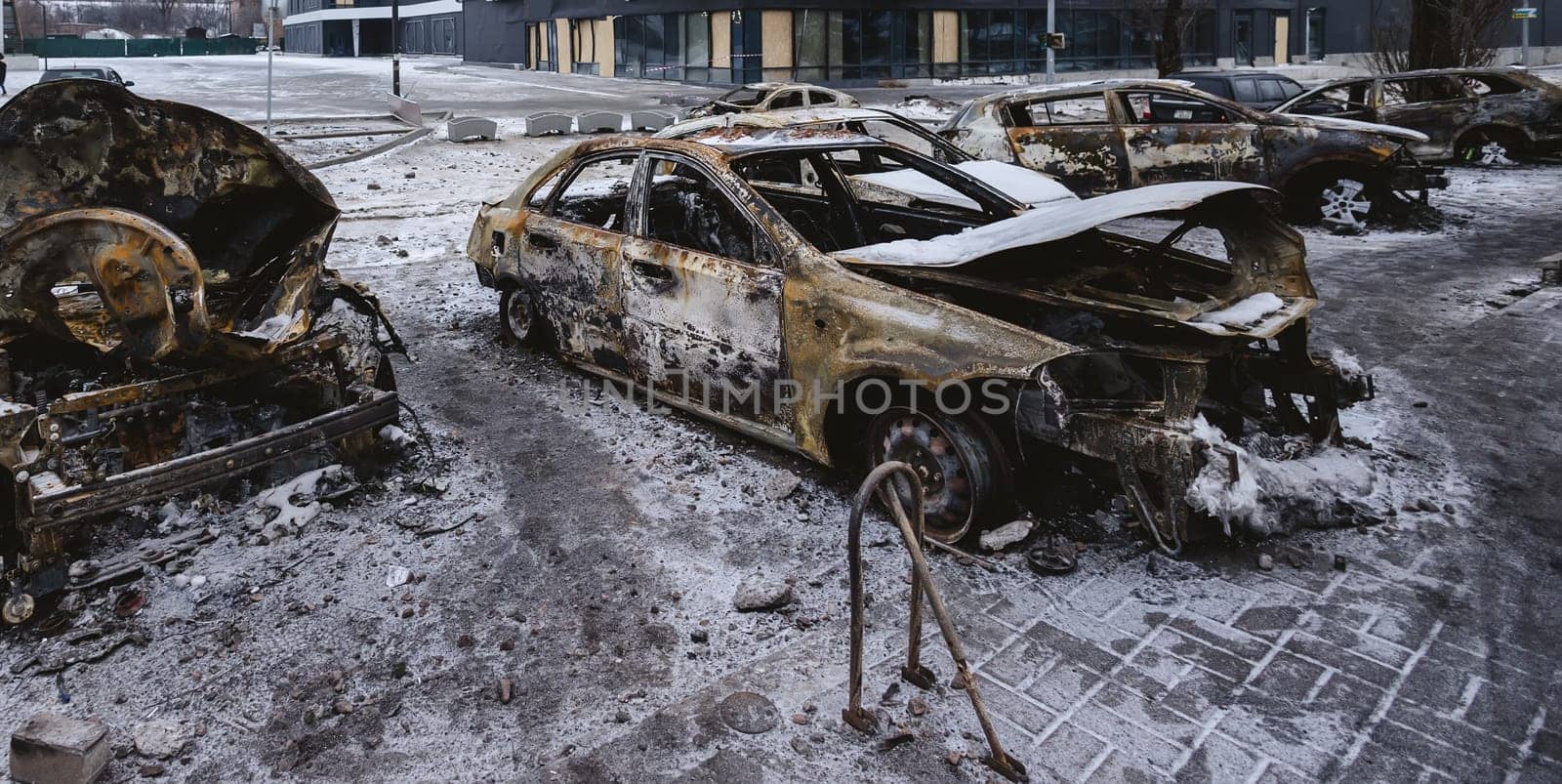 Kyiv, Ukraine - January 3, 2024: Burned civilians cars after a Russian's missiles attack.