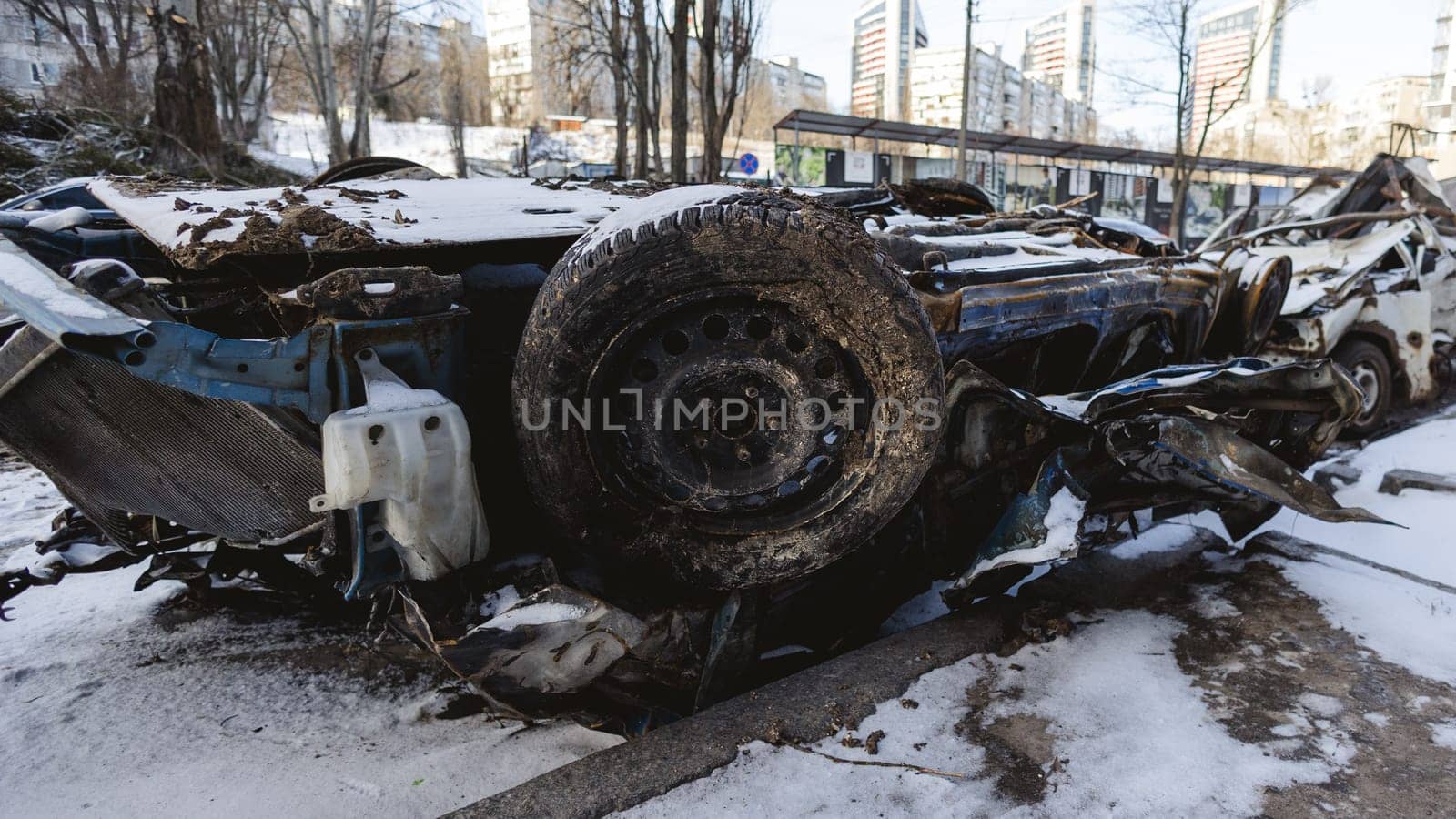 Kyiv, Ukraine - January 3, 2024: Burned civilians cars after a Russian's missiles attack.