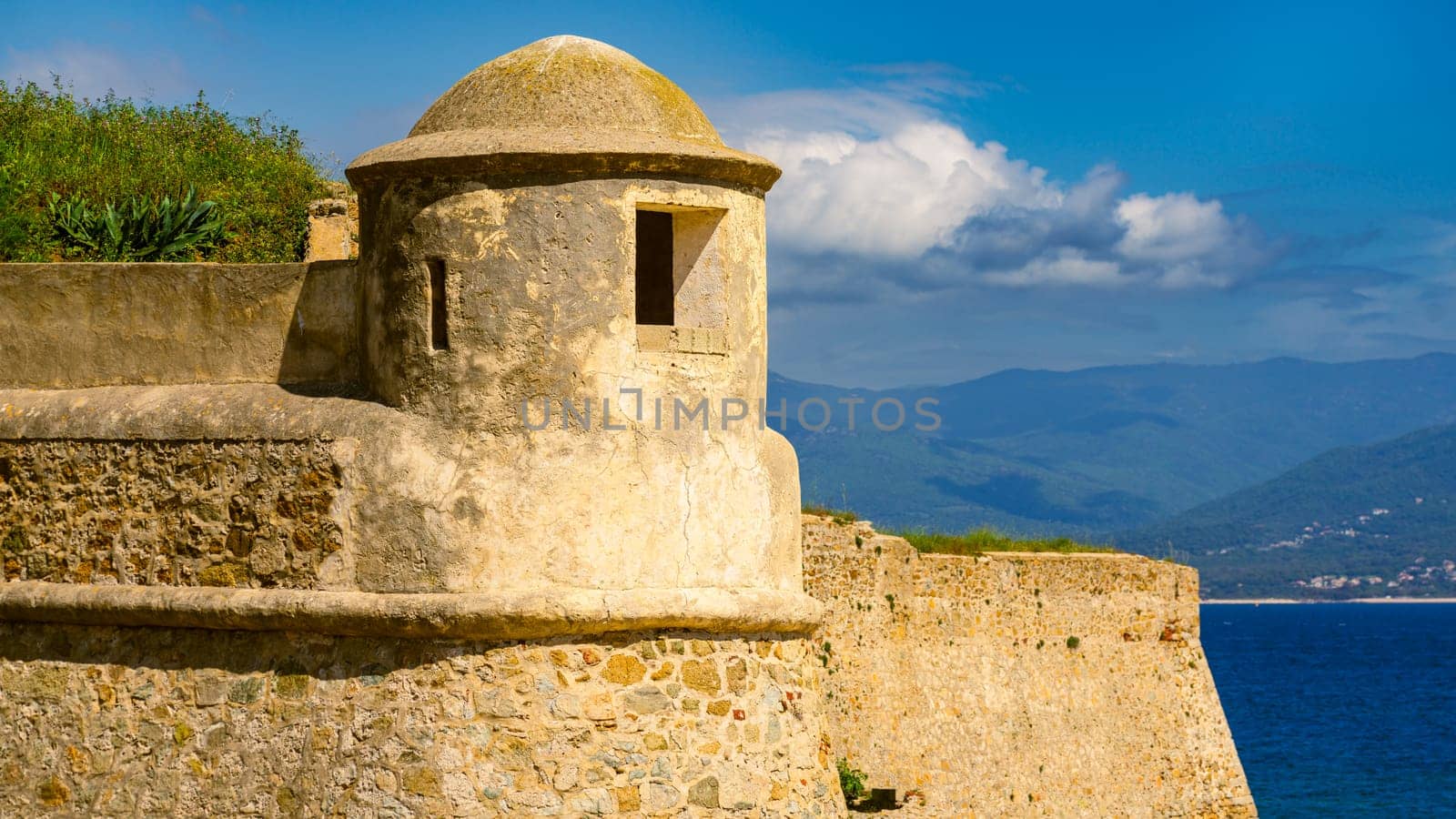 La Citadelle in Ajaccio, Old stone fortress and sandy beach in Corsica, France by vladispas
