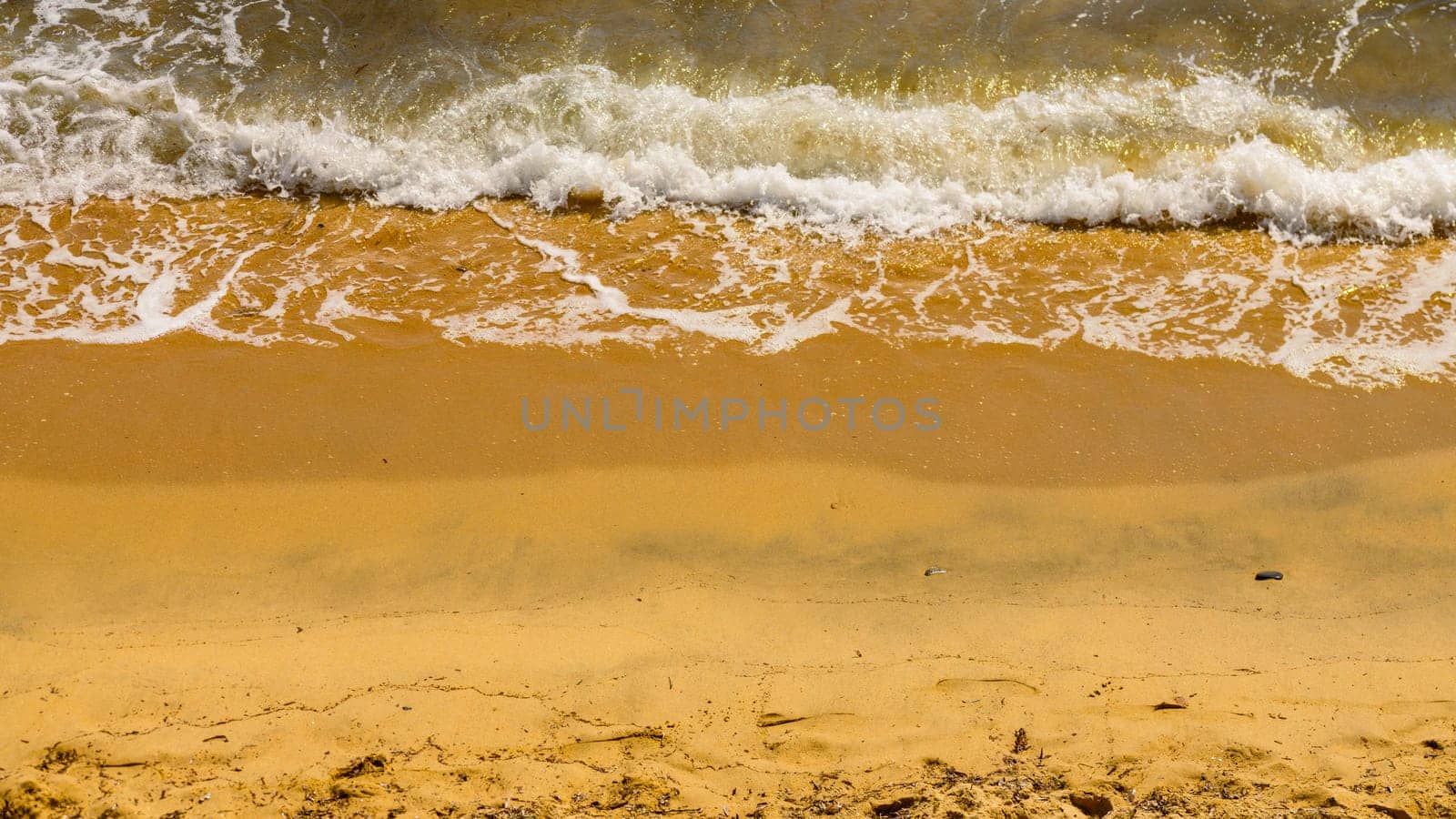 Waves hitting rocky shoreline by vladispas