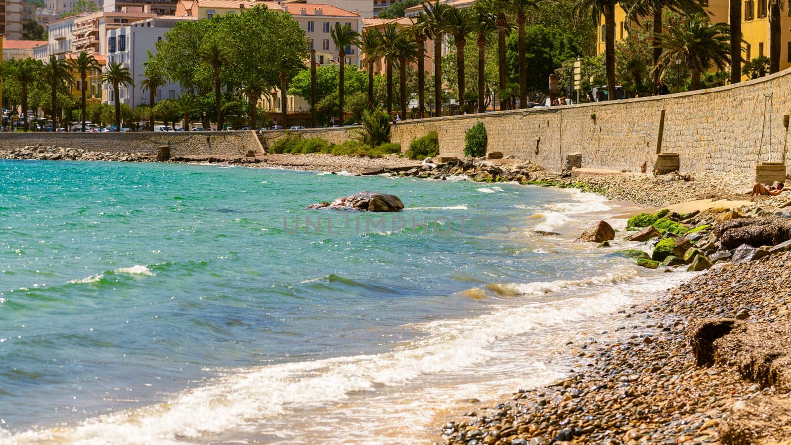 Ajaccio public beach, summer landscape of Corsica by vladispas
