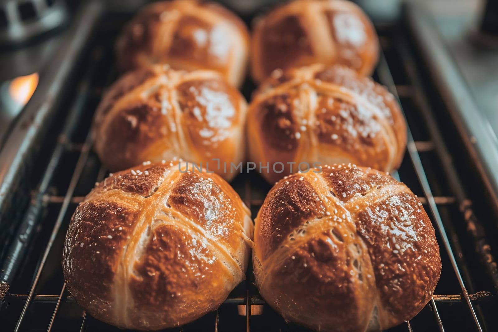Traditional Easter hot cross buns on a cooling rack. AI generated.